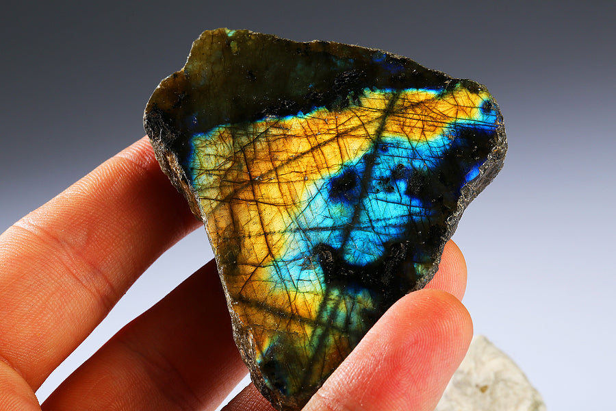 someone holding a labradorite stone