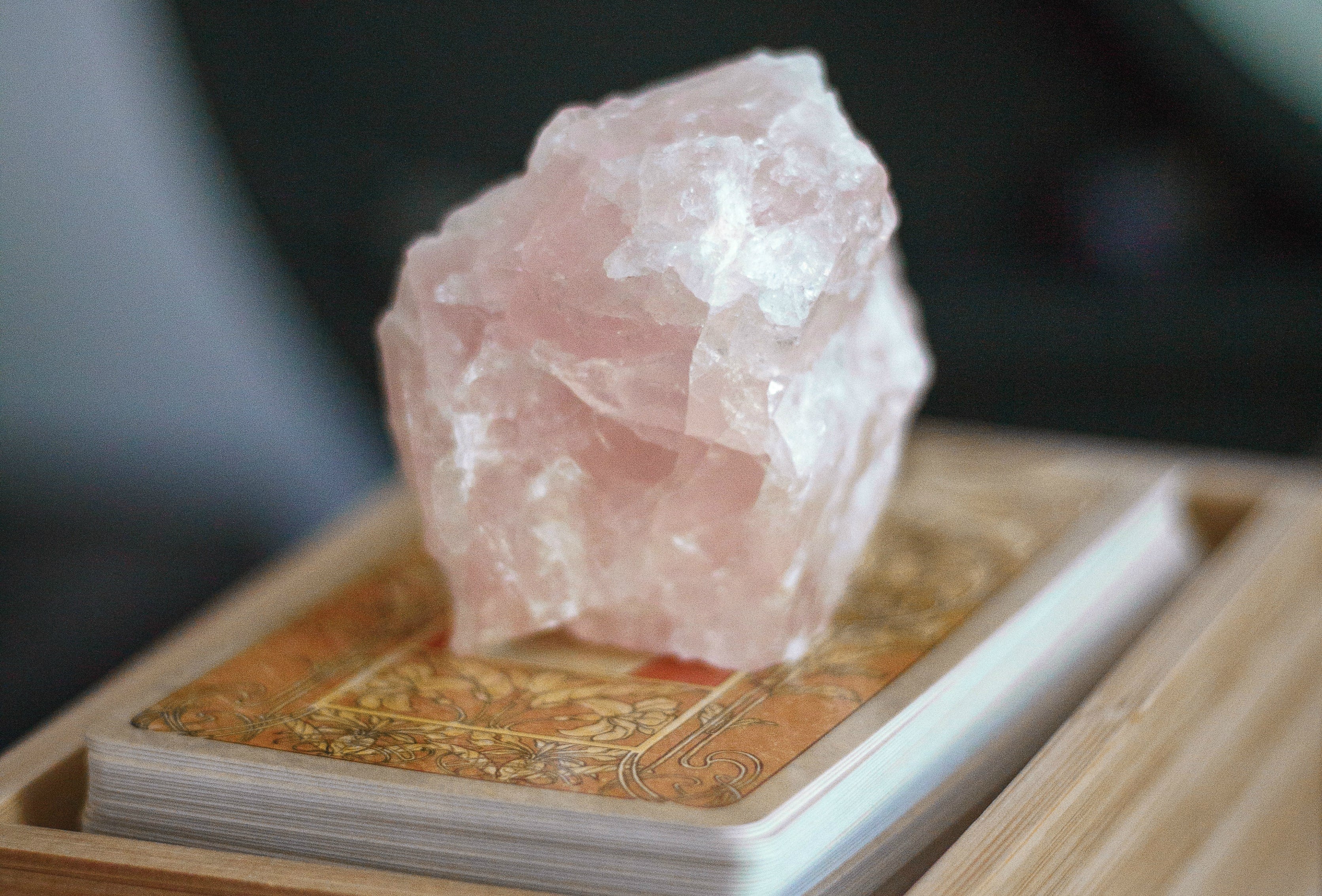 rose quartz on tarot cards