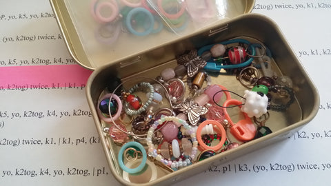 box of assorted stitch markers