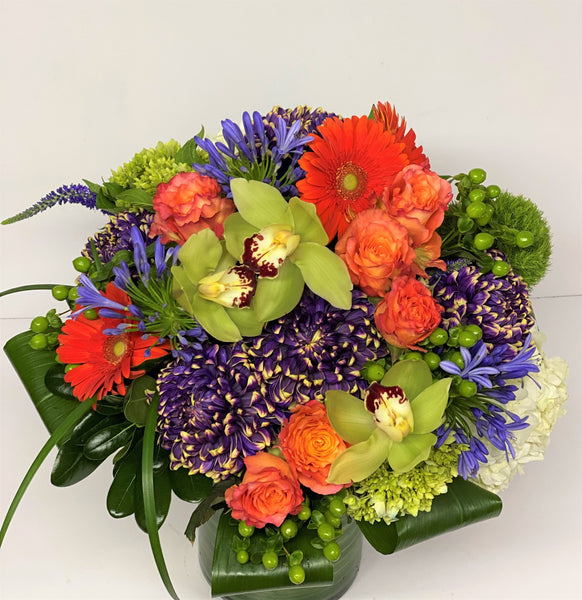 F31 - Vibrant Orange, Purple and White Vase Arrangement