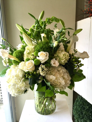 white fresh flower funeral vase arrangement