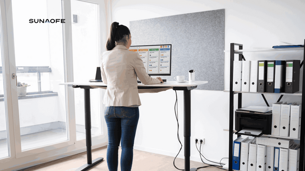 http://cdn.shopify.com/s/files/1/0273/7867/9908/files/How_Tall_Should_a_Standing_Desk_Be_-_Full_Guide_and_Calculator_sunaofe_blog_2240x1260_70880b8f-685a-4fcd-8043-1b29cf4c23bb_600x600.png?v=1677069634