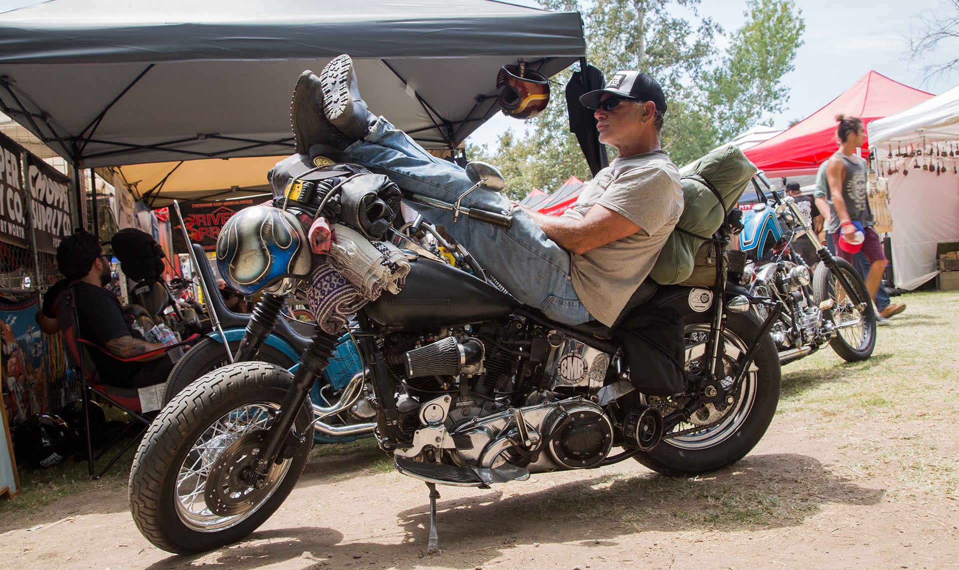 Biker Snoozing on his bike