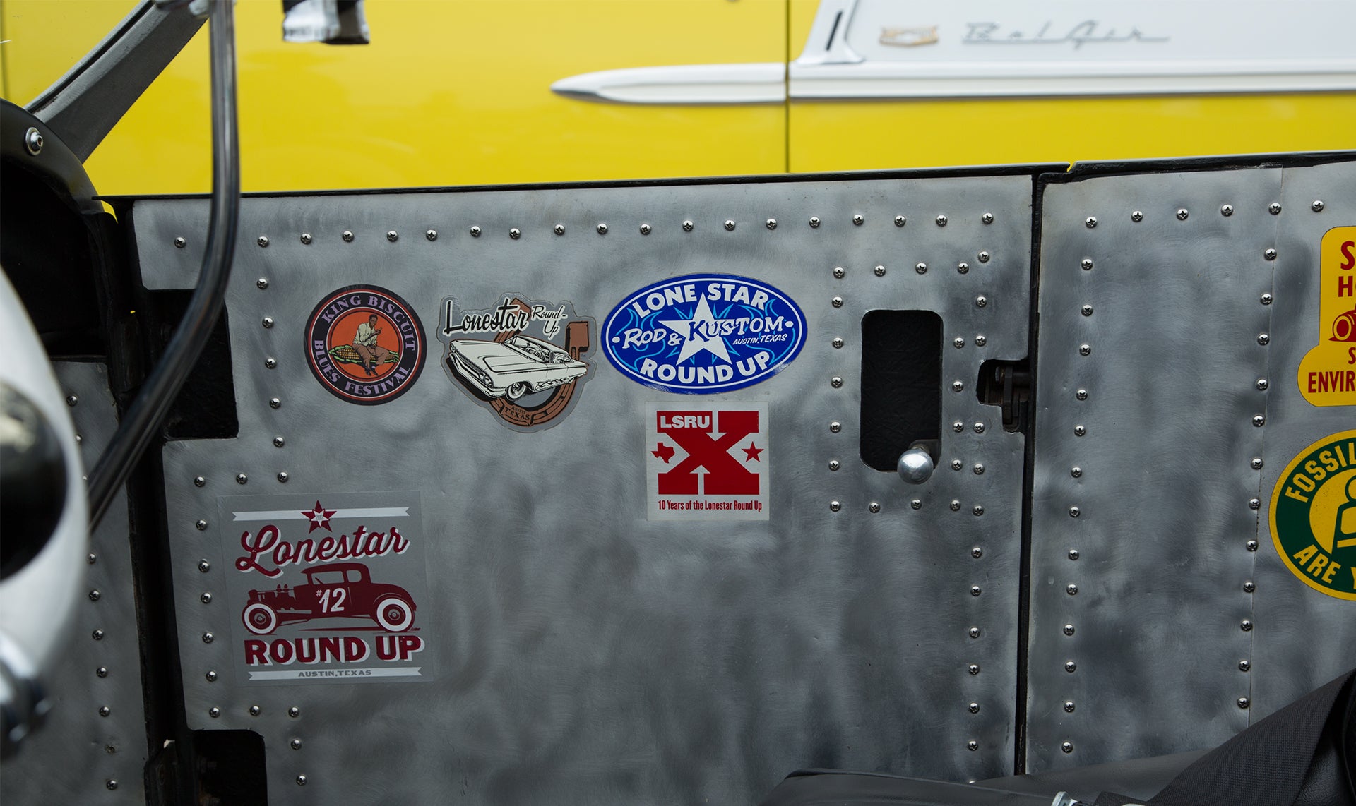 Inside of coupe door with previous Lonestar Roundup stickers