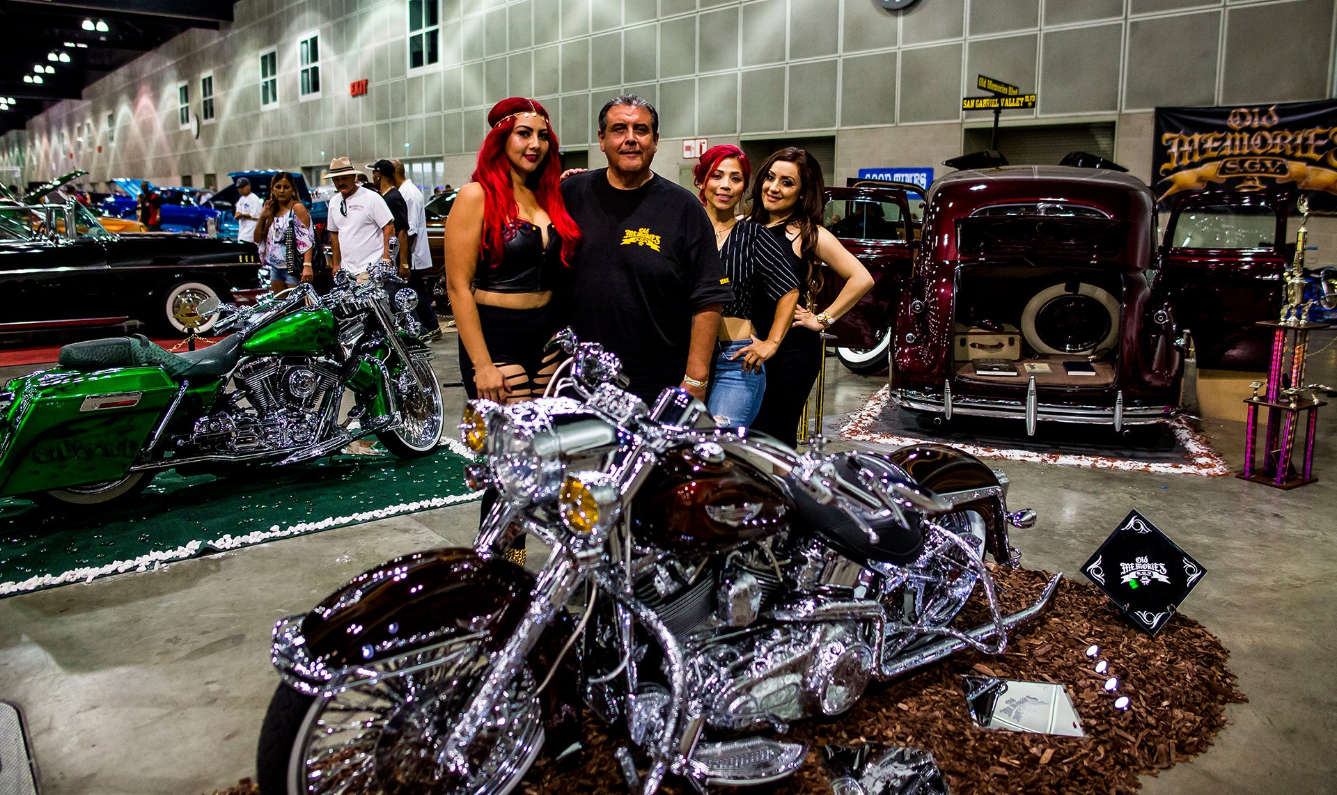 proud family next to their show class motorcycle
