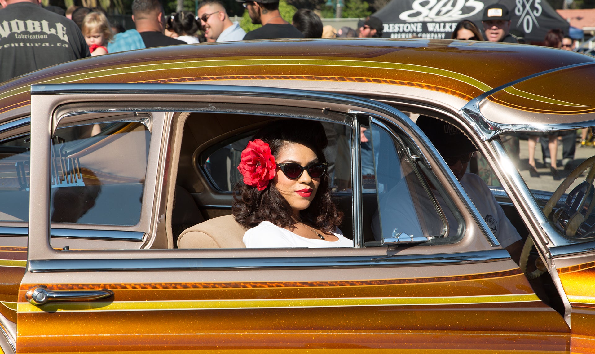 Good looking lady in a good looking car