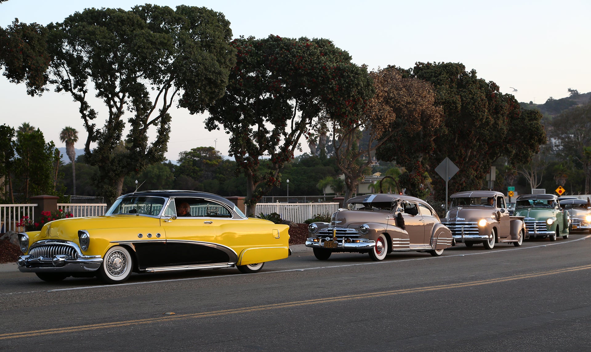 Yellow Buick leads the line as cars enter Ventura Nationals Carshow