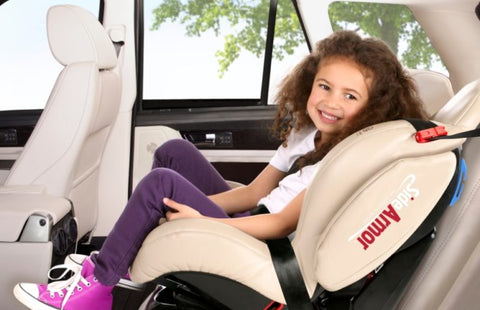 Child sitting in evolution car seat