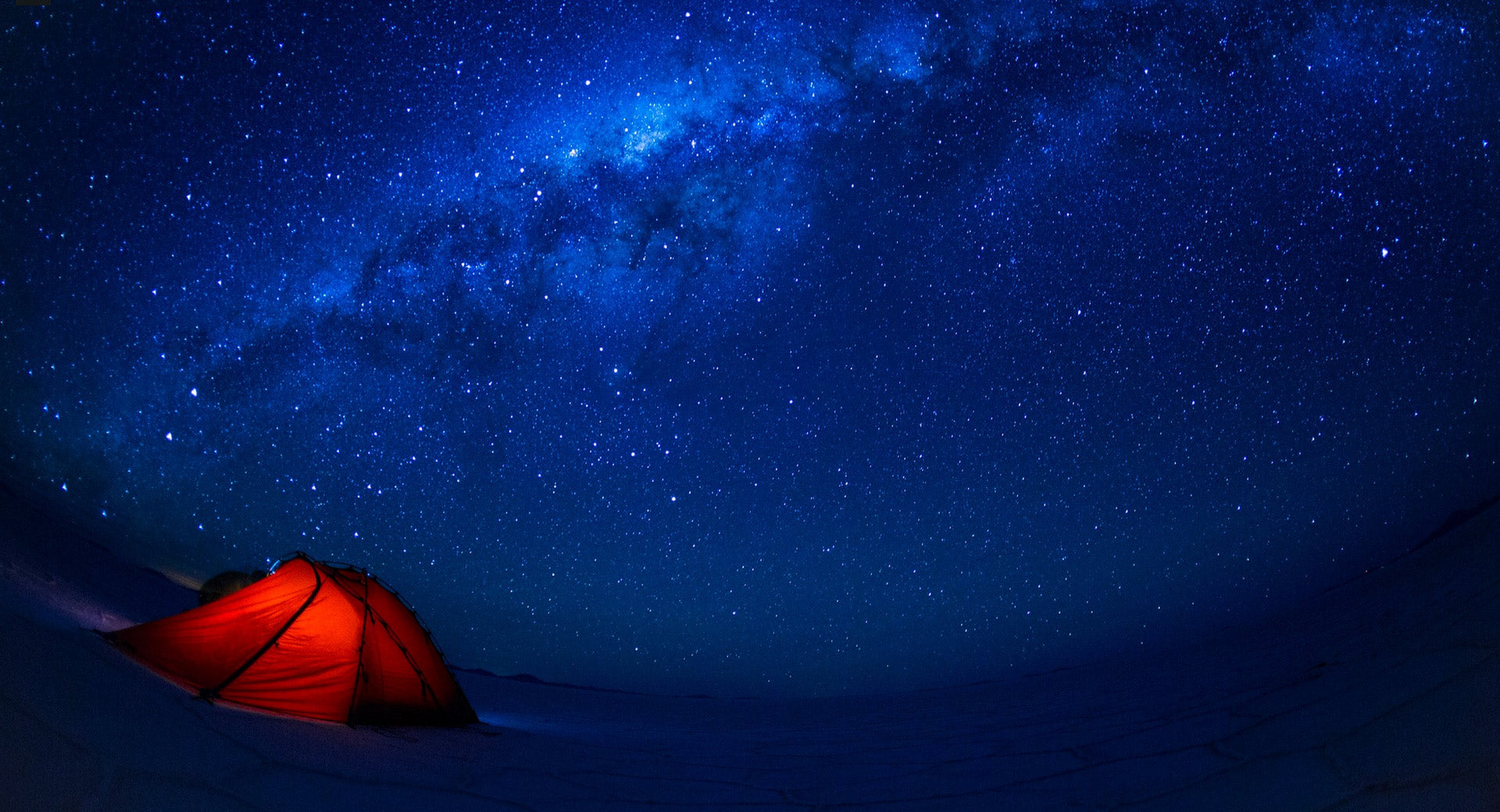 Tent under starry sky