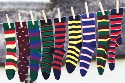 mens socks on a washing line