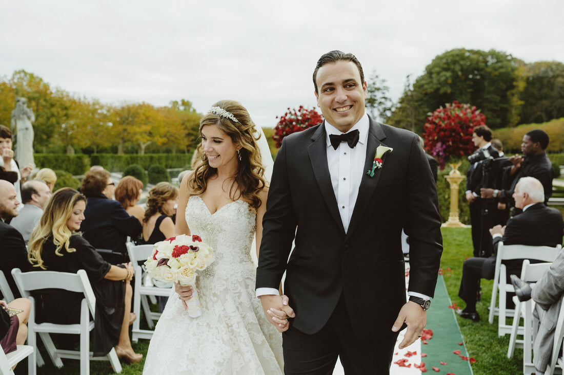 Couple Walks Down Aisle