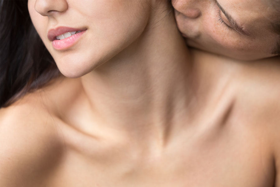 man kissing woman's neck, anniversary sex