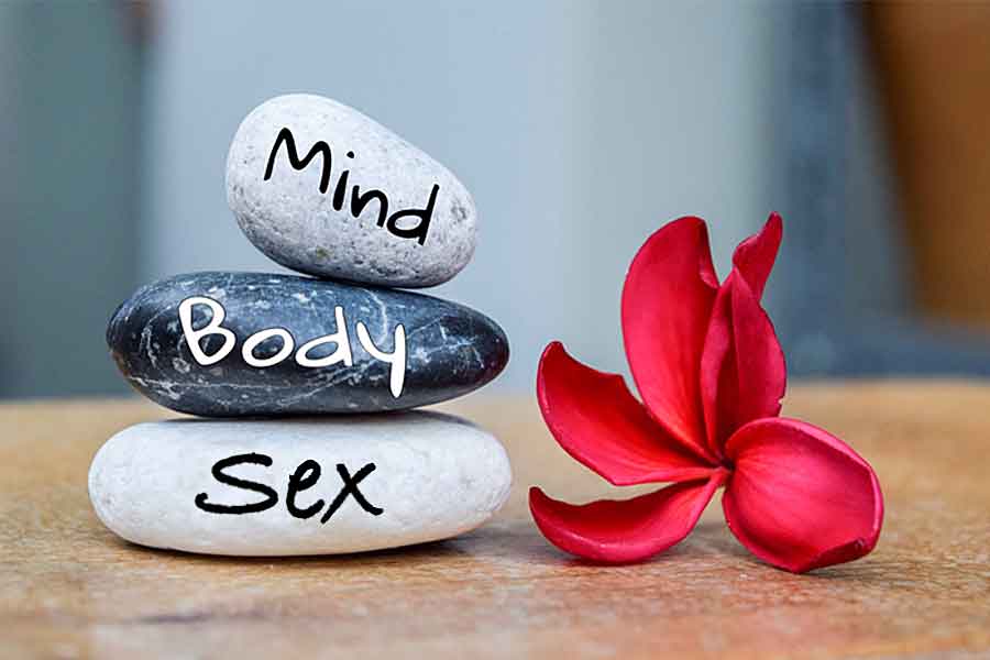 Stones labeled mind, body, sex, Holistic Health & Sex