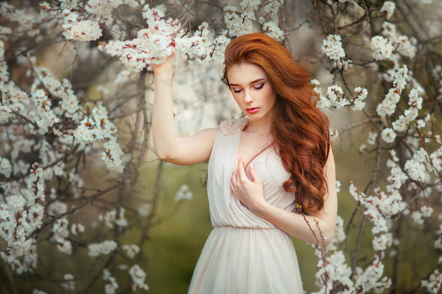 red hair, woman, flowering trees, raven haired virgin story