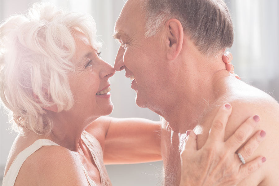 Elderly couple embracing, senior sex story