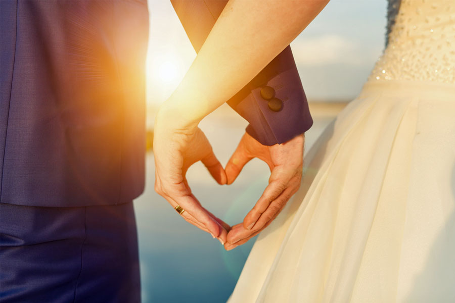 husband and wife making heart with hands, soulmates, true erotic story