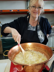 Woman making jam