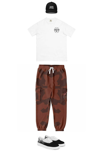an awesome comfortable casual brown cargo sweatpant with an embroidered white comfort color t-shirt paired with an embroidered streetwear dad hat with cool low top sneakers for an urban look for men