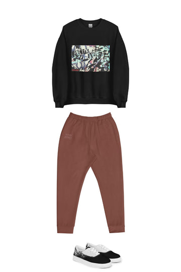 light brown men's joggers paired with a graffiti crew neck black sweatshirt with matching urban journey inspired low top sneakers to elevate this streetwear style for men