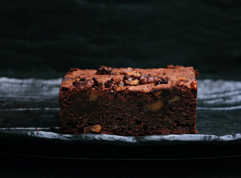 a rectangular slice of chocolate brownies