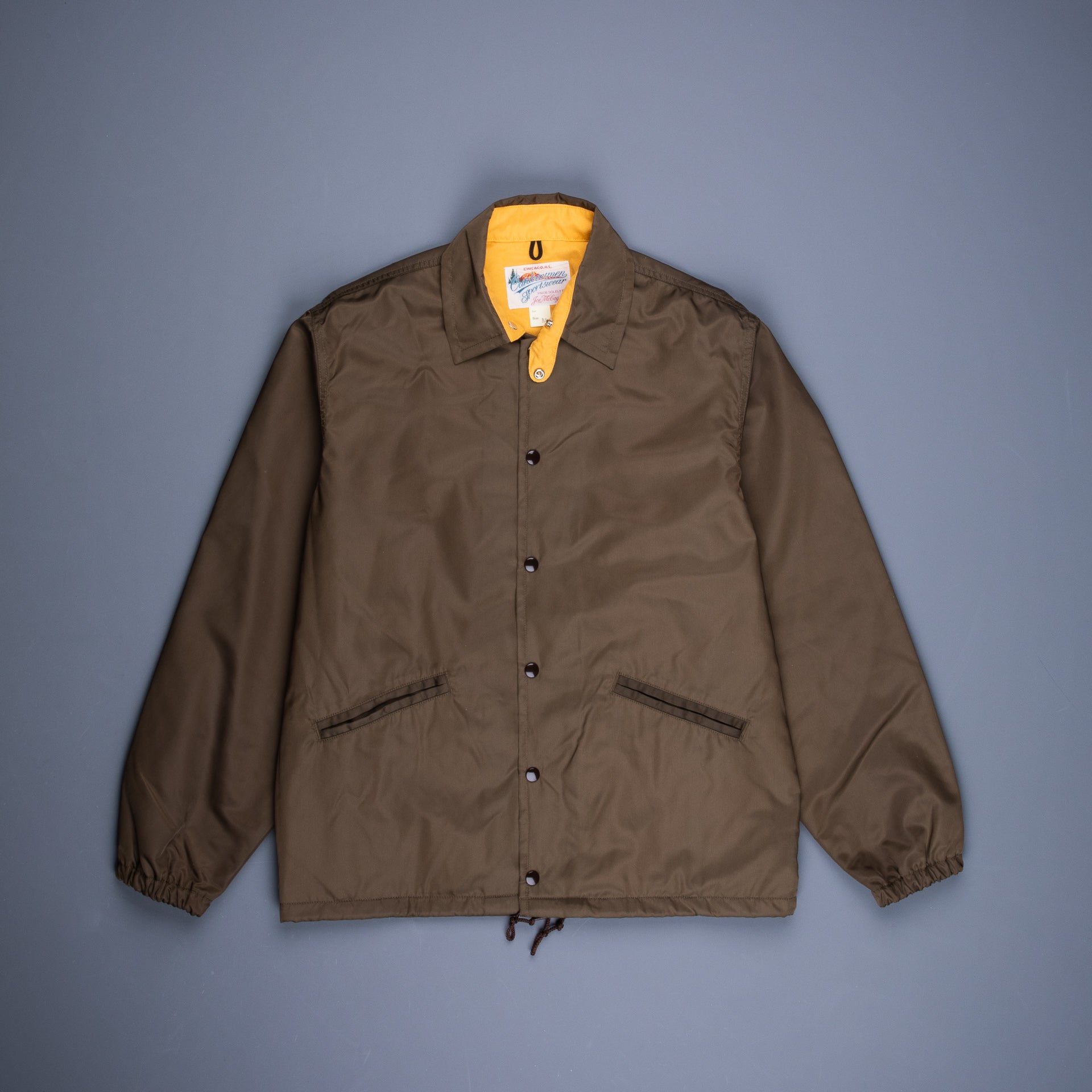 brown coach jacket