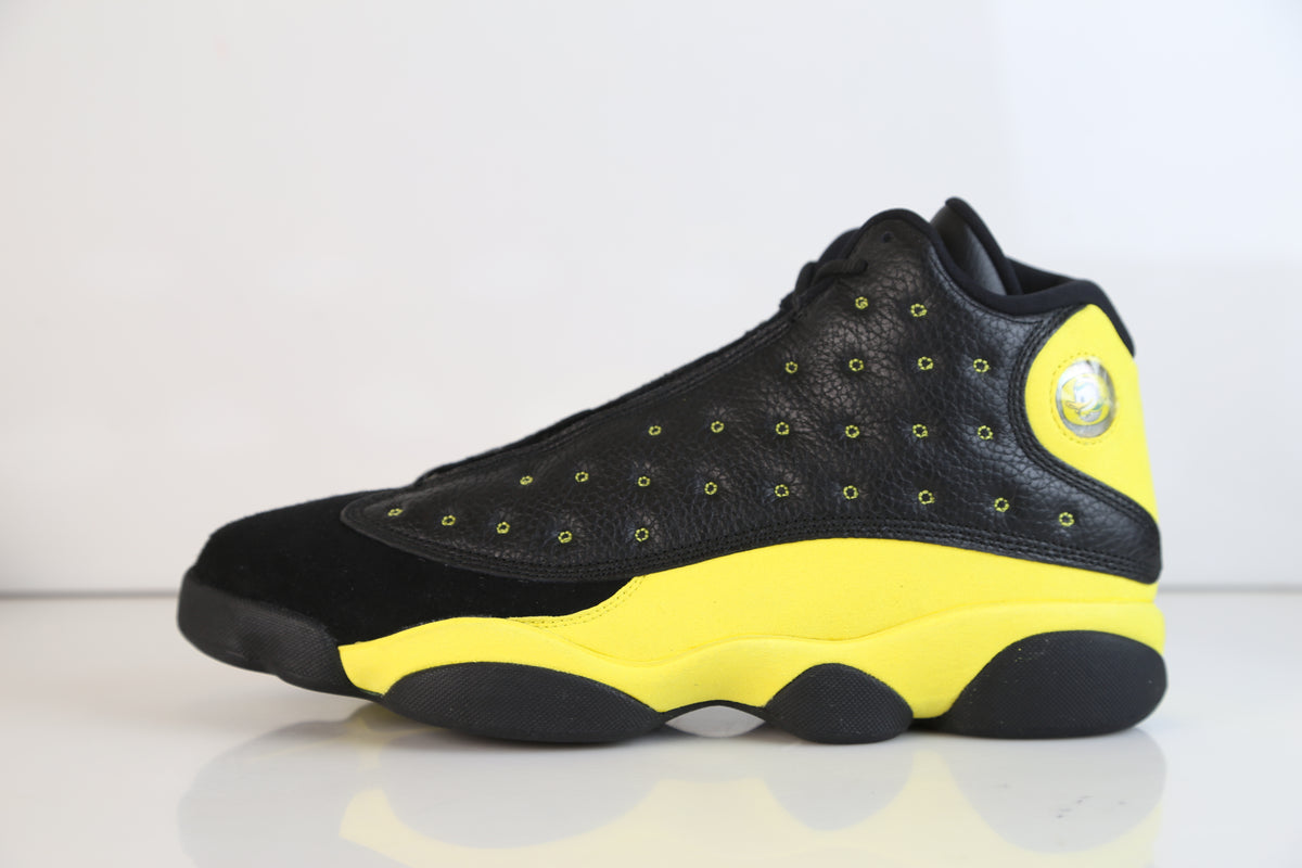 black and yellow retro 13s