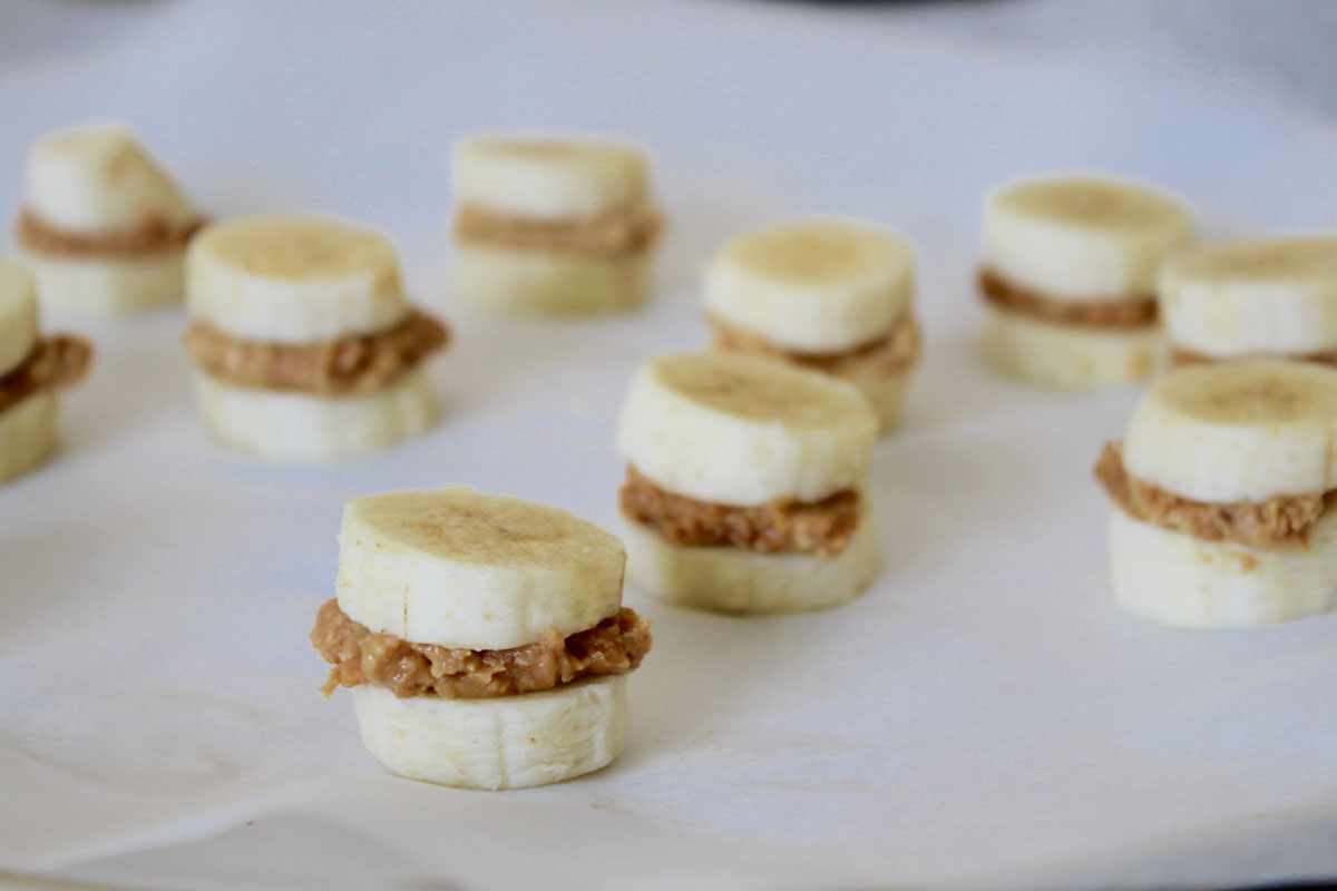 Chocolate covered bananas with peanut butter