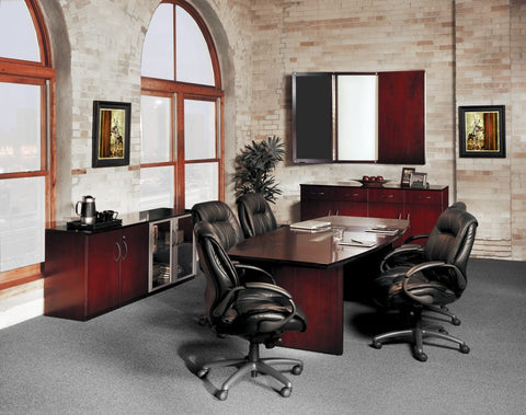 Leather executive chairs around a conference table