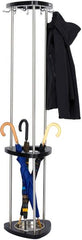 Coat rack with coat and umbrellas