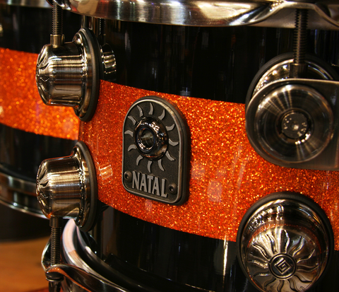 Natal black and orange sparkle split lacquer drum kit