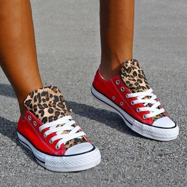 leopard sneakers with red laces