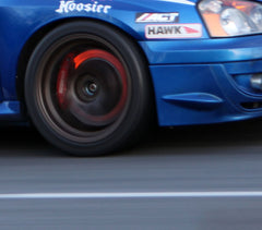 Race car with glowing rotors