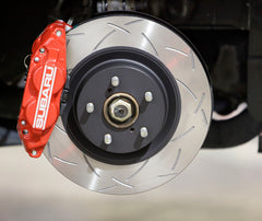 Subaru four-pot front brake system