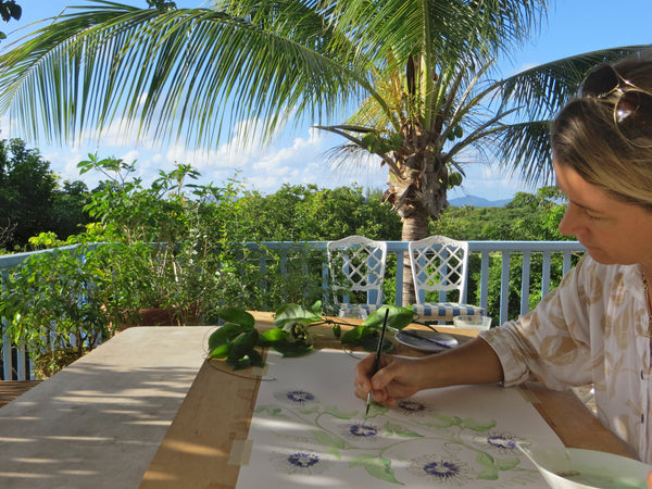 Lotty designing &painting at her home on Mustique