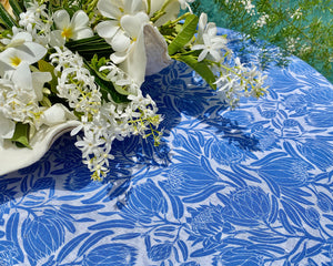 Beautiful linen tableware by Lotty B. Protea blue print tablecloth with 8 napkins
