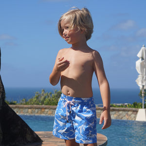 Childrens designer swim shorts whale print blue by designer Lotty B Mustique pool style