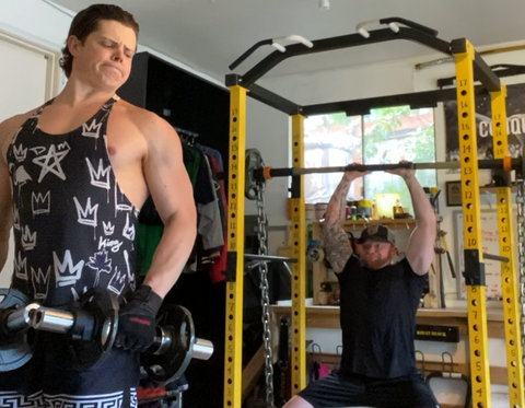 Behind-the-neck presses in our power rack