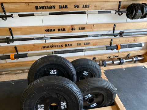35-lb weight plates made from cement and tires