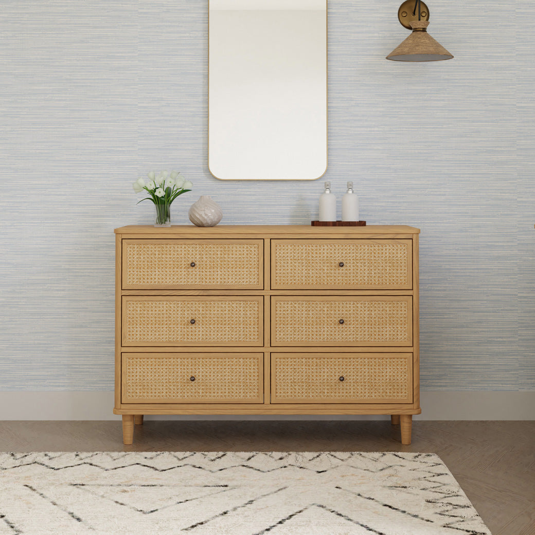 Front view of Namesake's Marin 6 Drawer Dresser under a mirror in -- Color_Honey/Honey Cane