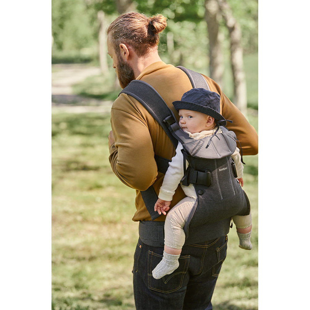 Back side view of BABYBJÖRN Baby Carrier One in -- Color_Denim Gray/Dark Gray Cotton