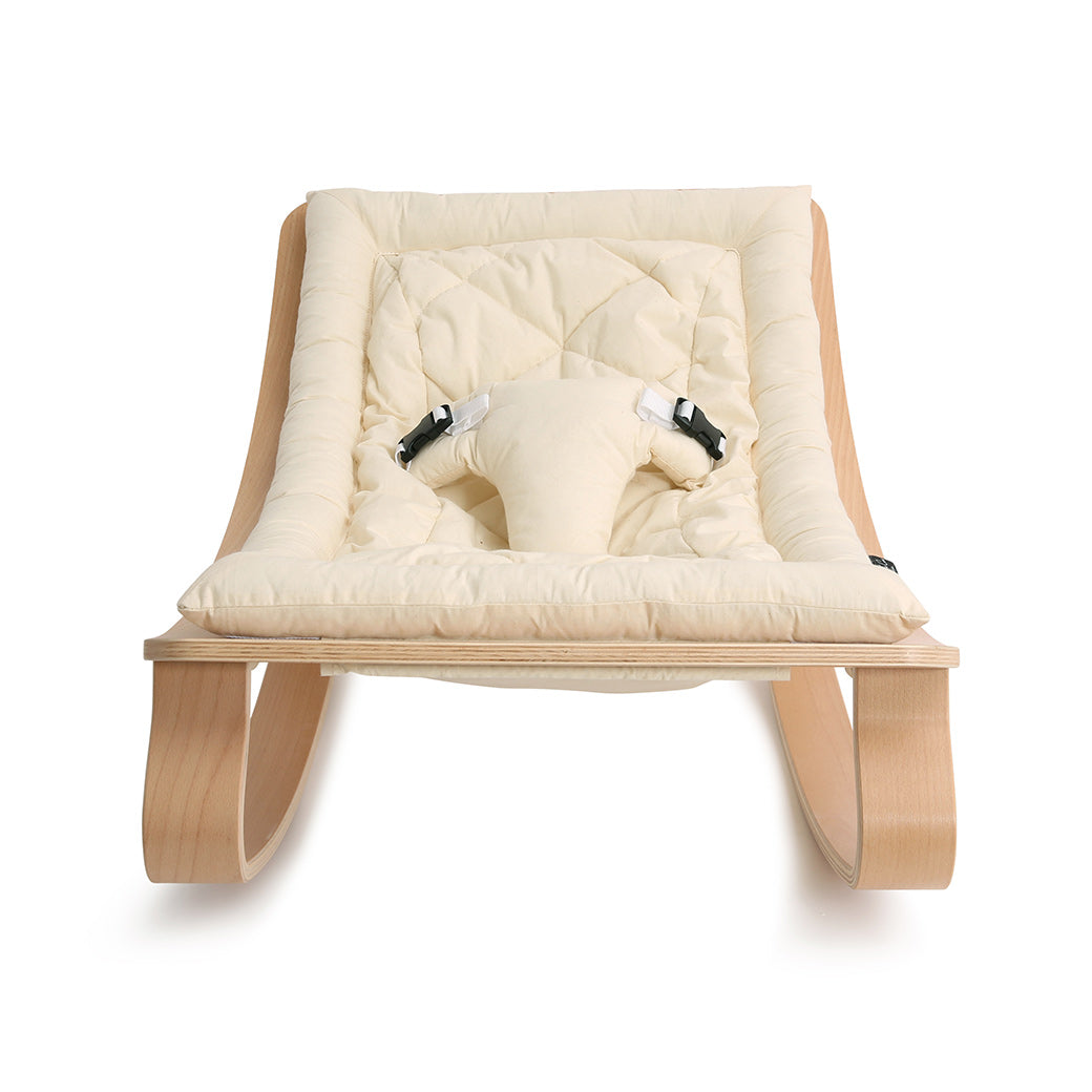 Front view of Charlie Crane LEVO Baby Rocker in -- Color_Organic White _ Beech