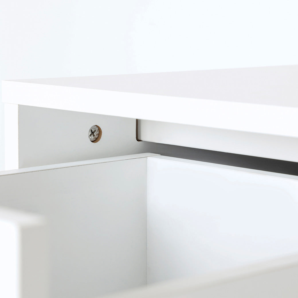 Closeup of Dadada Austin 5-Drawer Dresser open drawer in -- Color_White/Natural