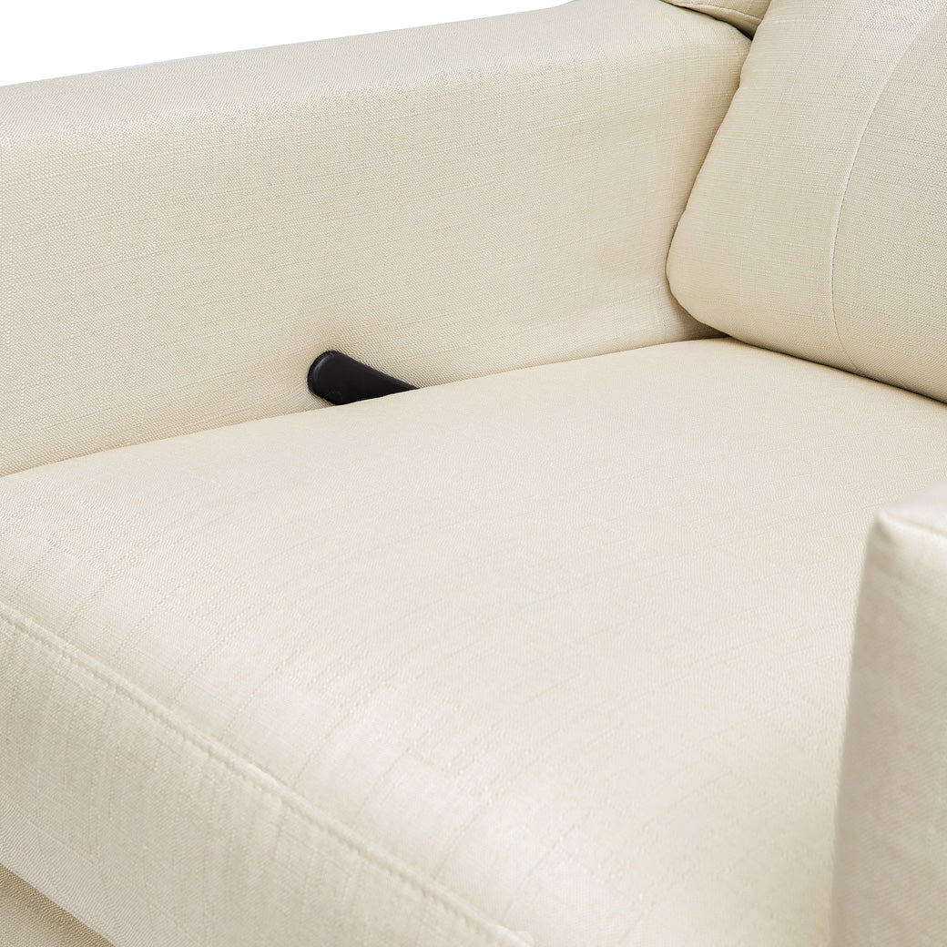 Closeup of lever of DaVinci's Maddox Recliner & Swivel Glider in -- Color_Natural Oat