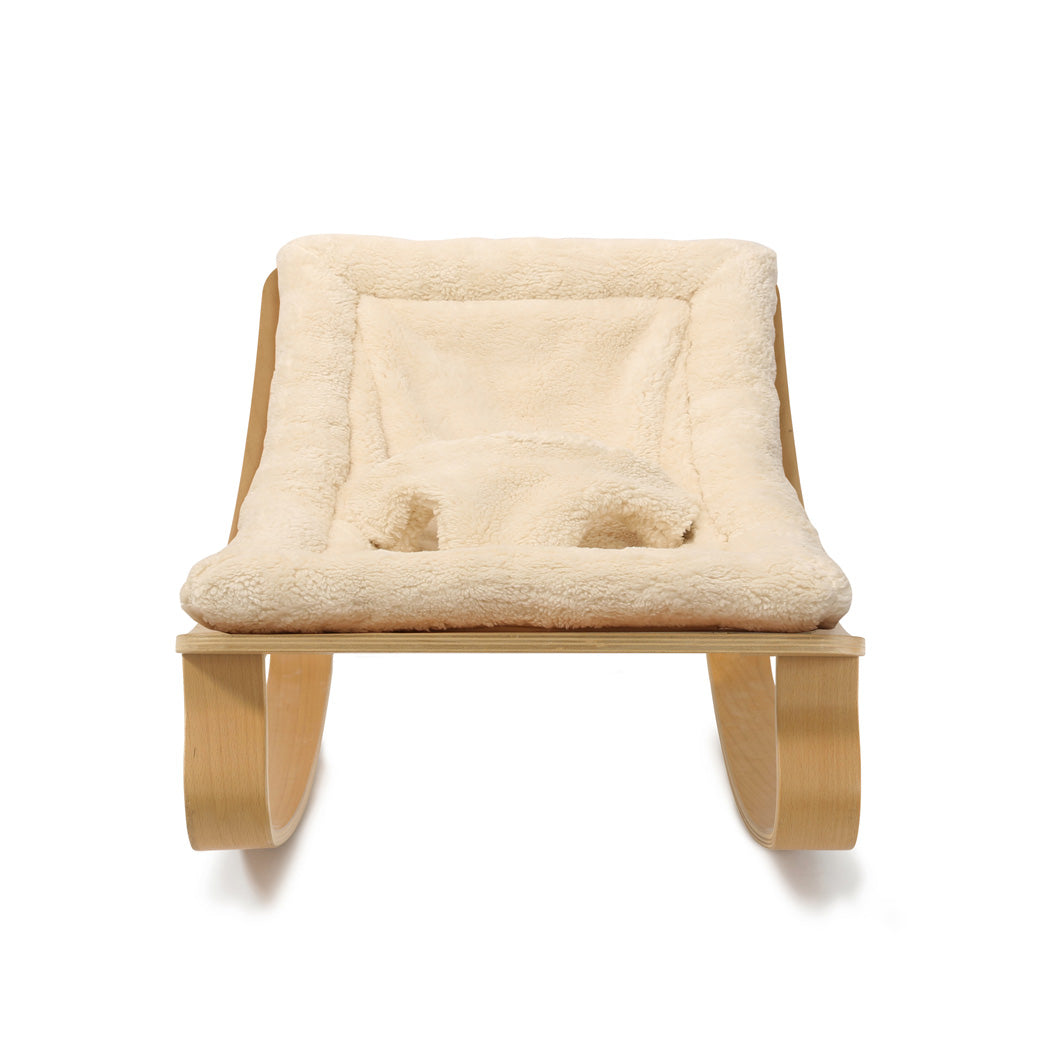 Front view of Charlie Crane LEVO Baby Rocker in -- Color_Fur Milk _ Beech