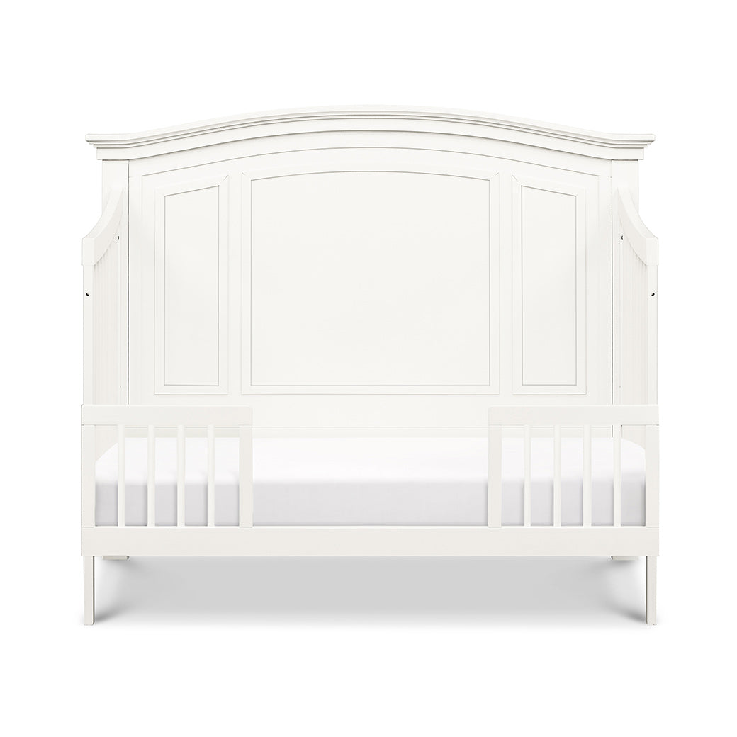 Front view of Namesake's Durham 4-in-1 Convertible Crib as toddler bed in -- Color_Warm White