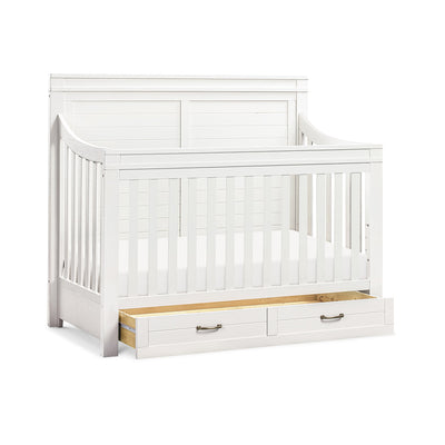 Namesake's Wesley Farmhouse 4-in-1 Convertible Storage Crib with drawers open in -- Color_Heirloom White