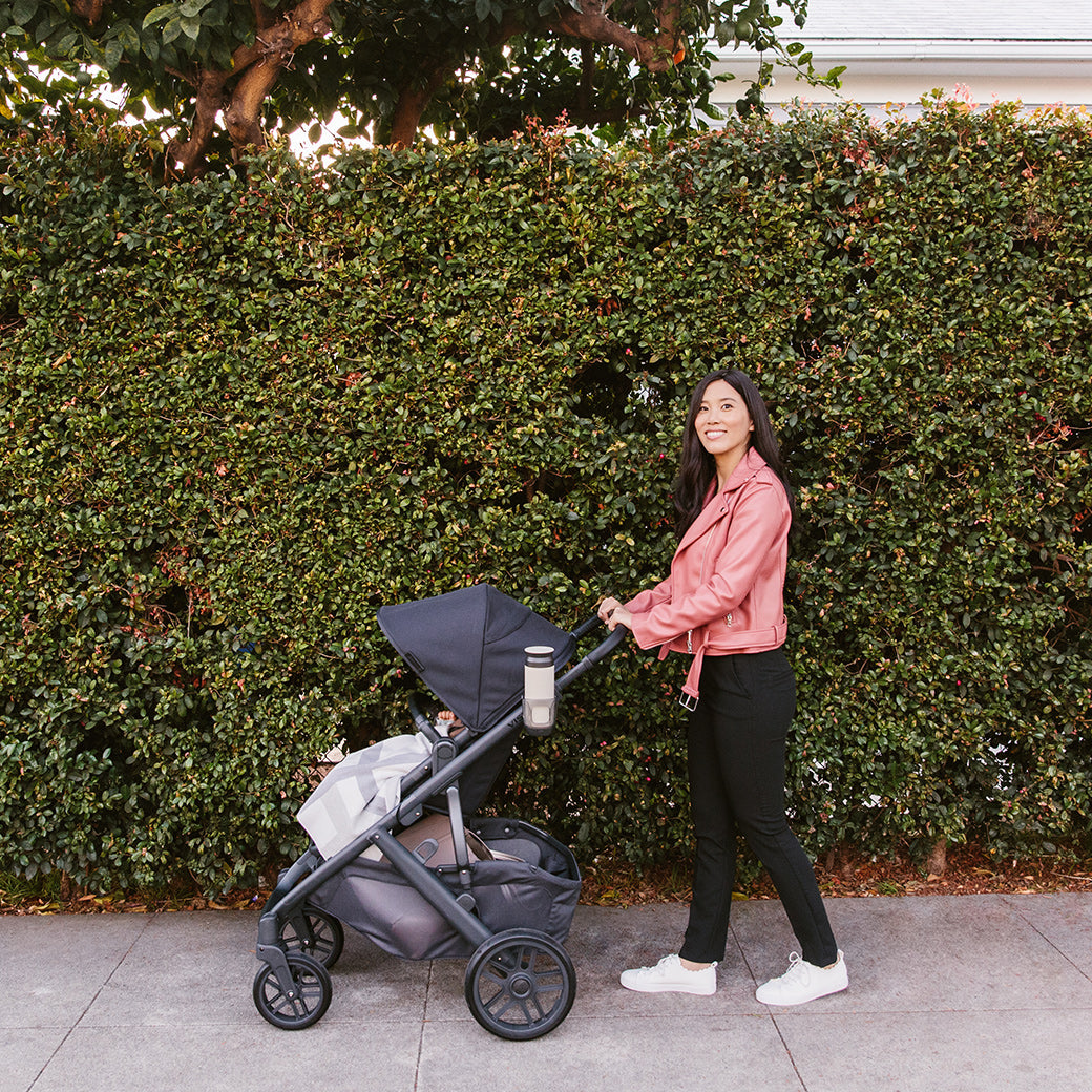 women pushing vista v2 stroller in Jake while walking -- Color_Jake