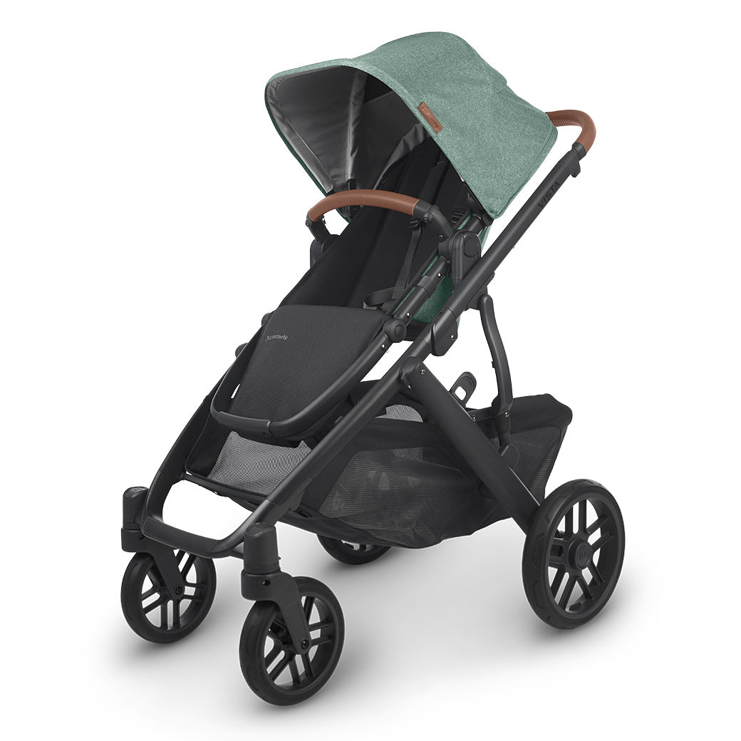 The half extended sunshade on right side view of the uppababy vista v2 stroller -- Color_Gwen