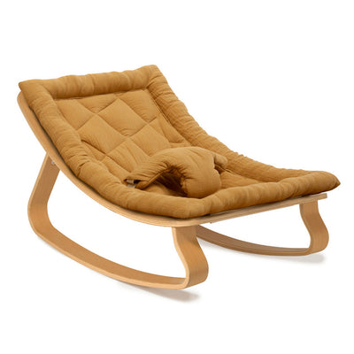 Side view of Charlie Crane LEVO Baby Rocker in -- Color_Camel _ Beech