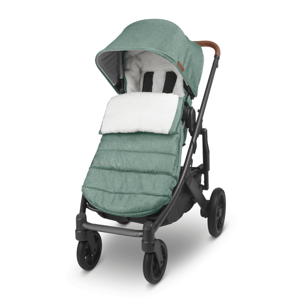 the ultra-plush CozyGanoosh footmuff putting on the green stroller -- Color_Emmett